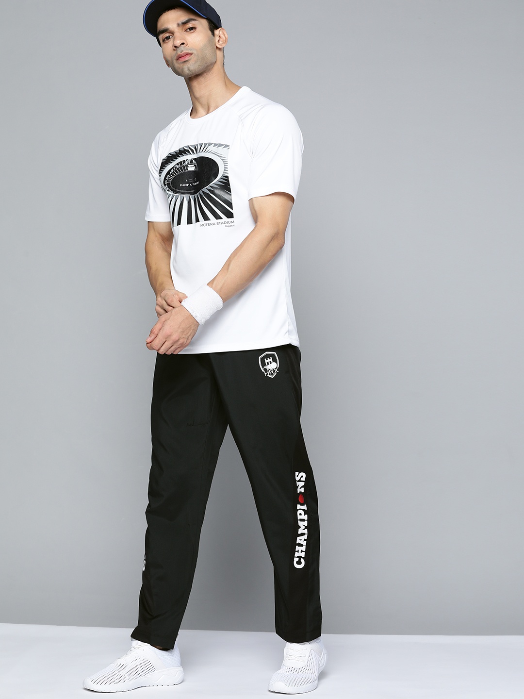 

HRX By Hrithik Roshan Cricket Men Black Rapid-Dry Typography Track Pants