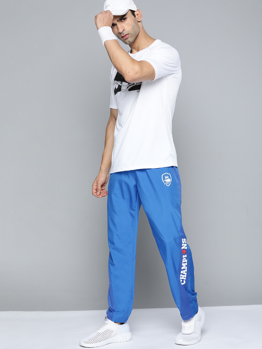 

HRX By Hrithik Roshan Cricket Men Blue Rapid-Dry Typography Track Pants