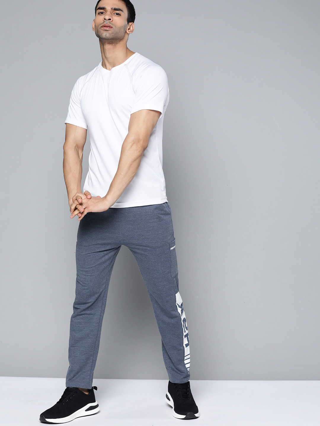 

HRX by Hrithik Roshan Training Men Navy Melange Brand Logo Track Pants, Navy blue