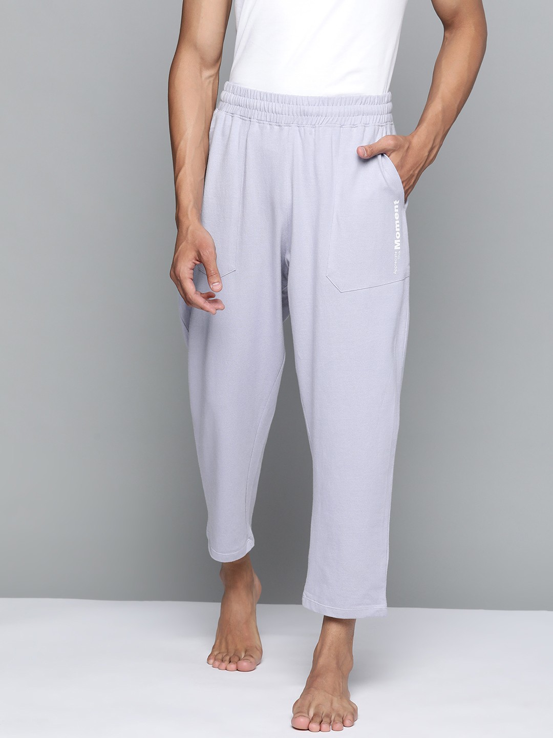 

HRX By Hrithik Roshan Yoga Men Blue Pure Cotton Typography Sustainable Track Pants