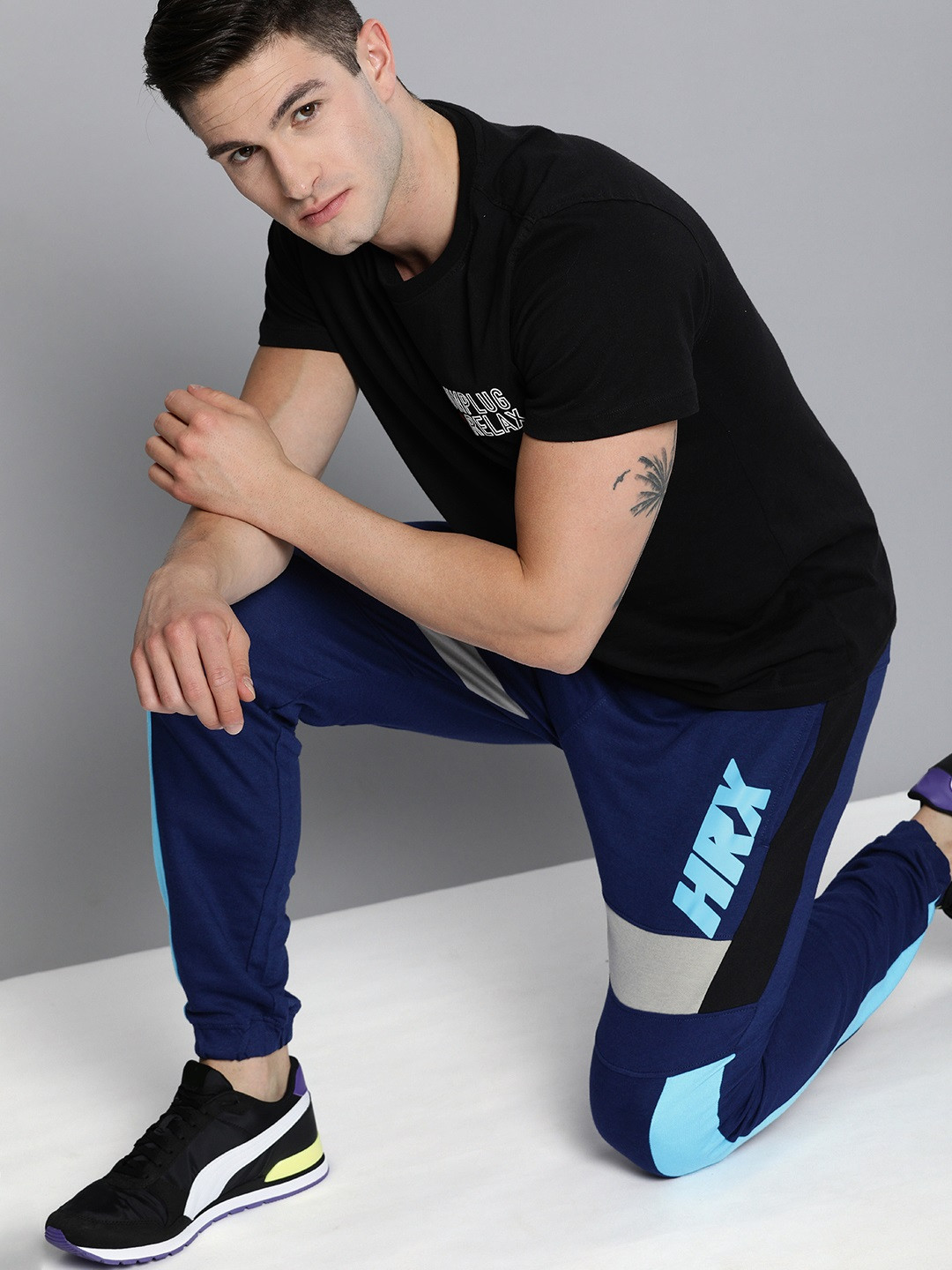 

HRX By Hrithik Roshan Lifestyle Men Wet Weather Bio-Wash Colourblock Joggers, Navy blue
