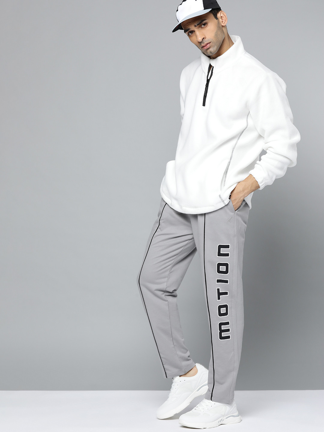 

HRX By Hrithik Roshan Lifestyle Men Wet Weather Bio-Wash Typography Track Pants, Grey