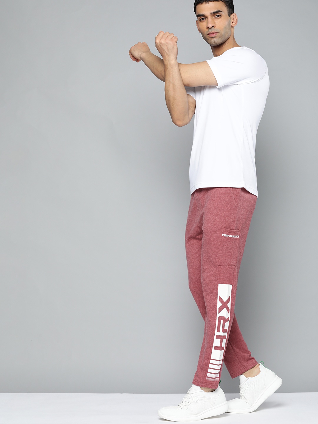 

HRX By Hrithik Roshan Training Men Pink Melange Brand Logo Track Pants