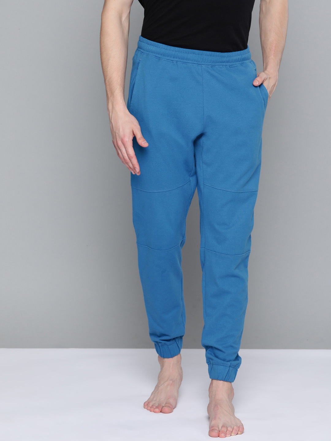 

HRX By Hrithik Roshan Yoga Men Atlantic Blue Rapid-Dry Typography Sustainable Track Pants
