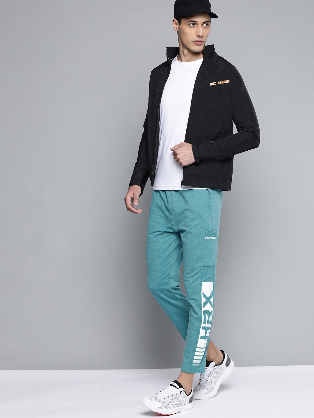 HRX By Hrithik Roshan Training Men Teal Melange Brand Logo Track Pants, Blue