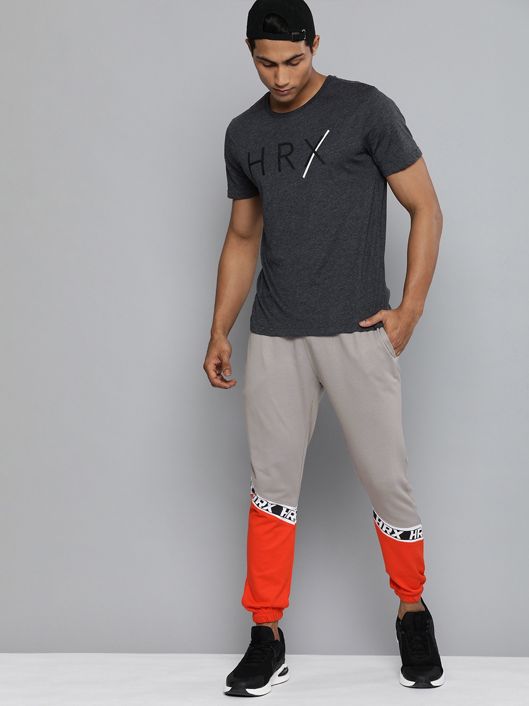 

HRX By Hrithik Roshan Lifestyle Men Grey & Orange Bio-Wash Colourblocked Joggers