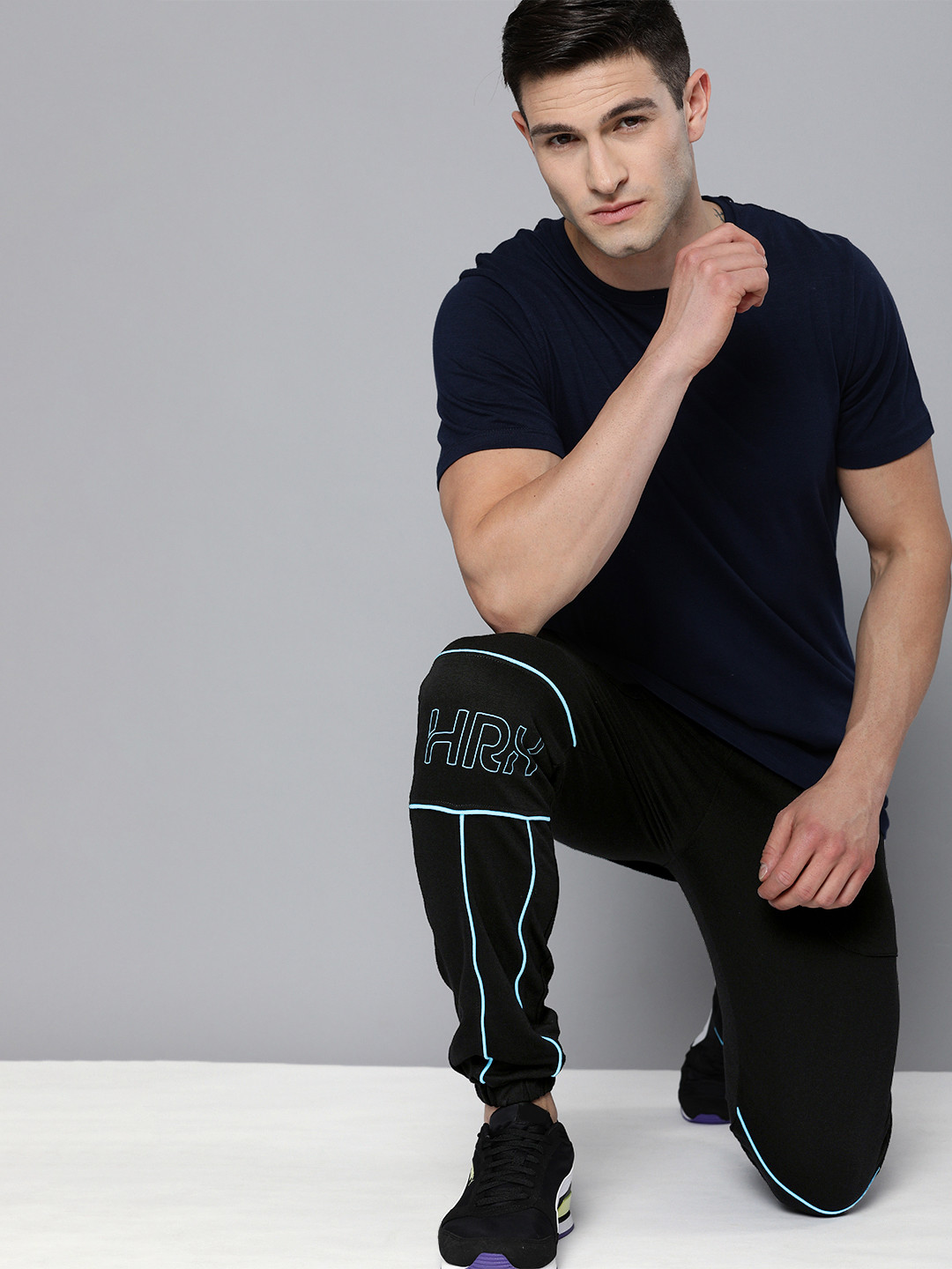 

HRX By Hrithik Roshan Lifestyle Men Jet Black Bio-Wash Colourblock Joggers