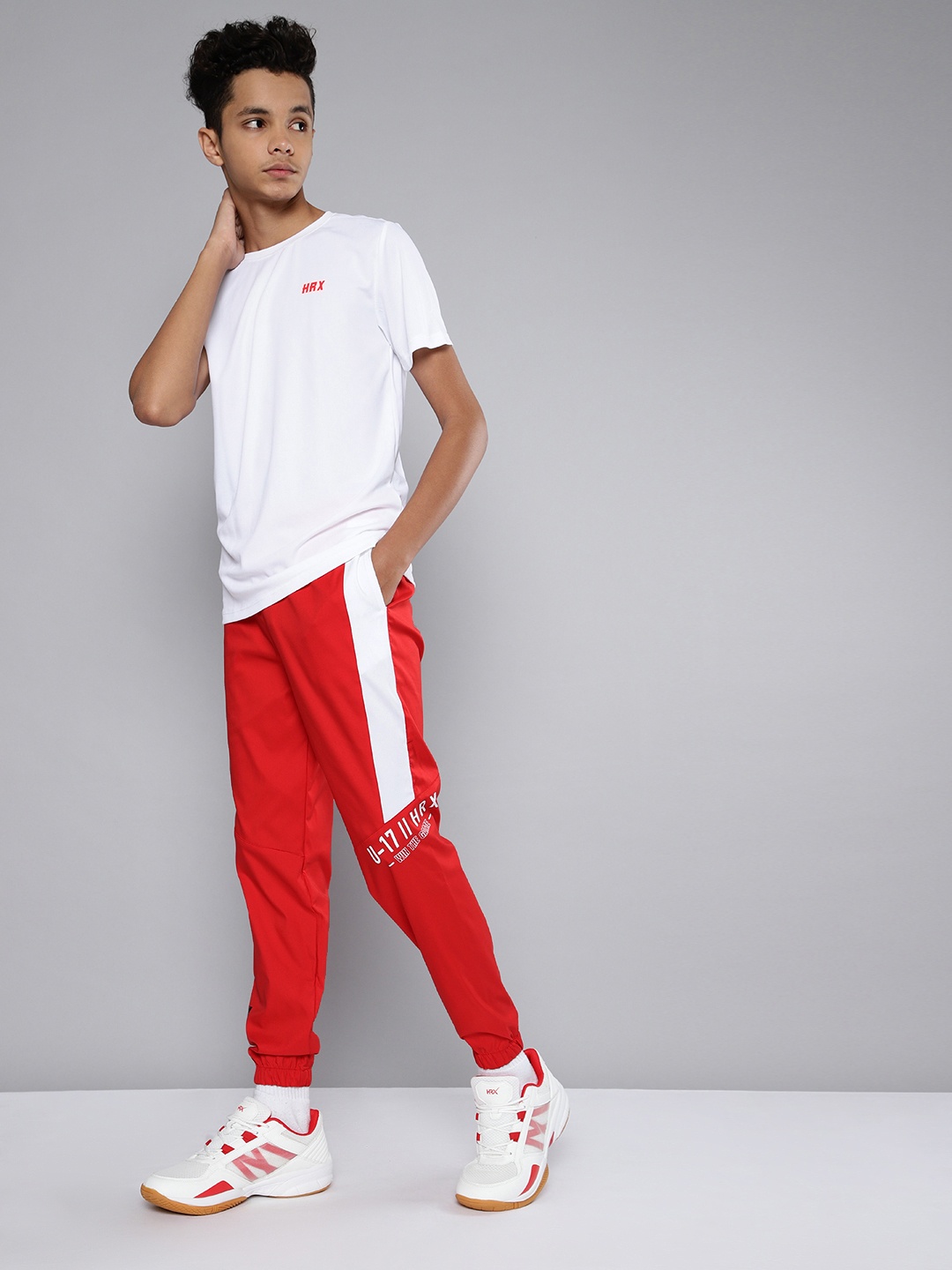 

HRX By Hrithik Roshan U-17 Active Boys High Risk Red Rapid-Dry Colourblock Joggers