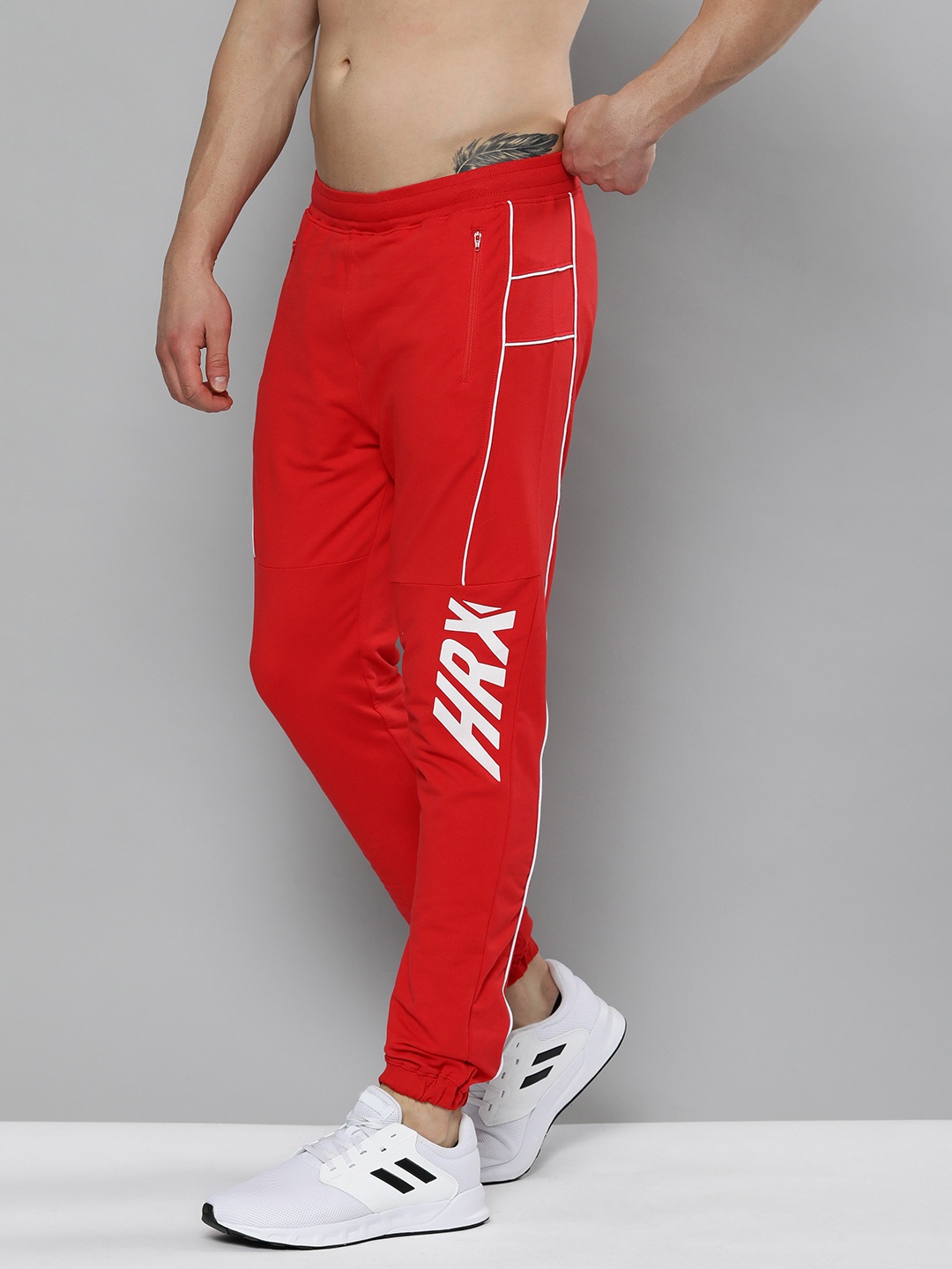 

HRX By Hrithik Roshan Lifestyle Men Red & White Lycra Printed Joggers