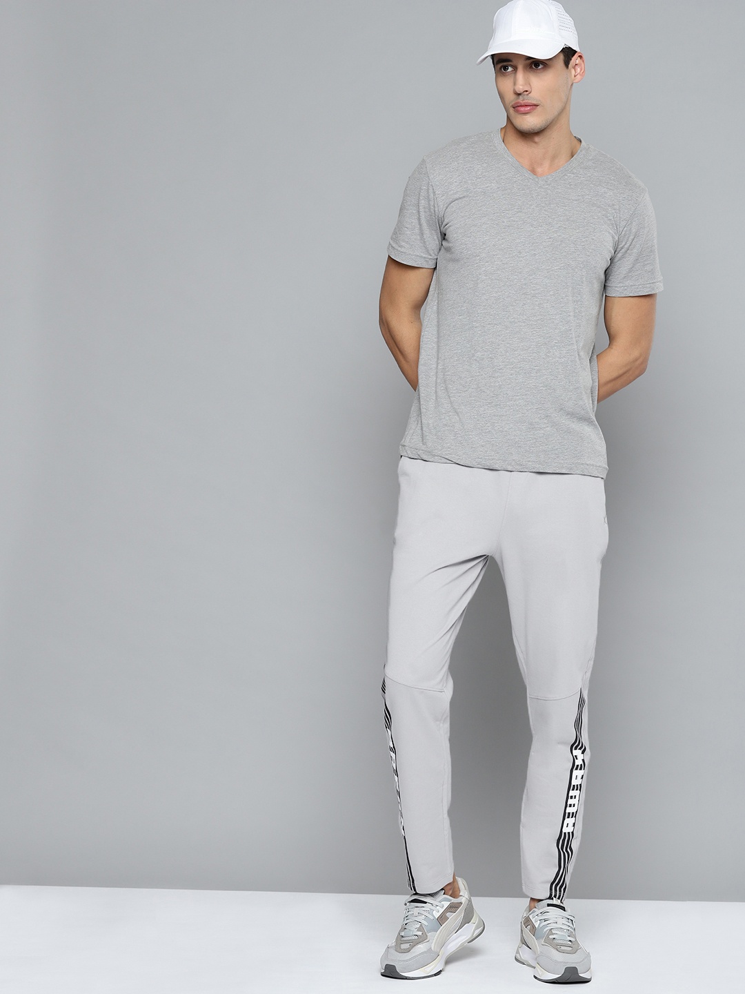 

HRX By Hrithik Roshan Lifestyle Men Wet Weather Cotton Bio-Wash Typography Track Pants, Grey