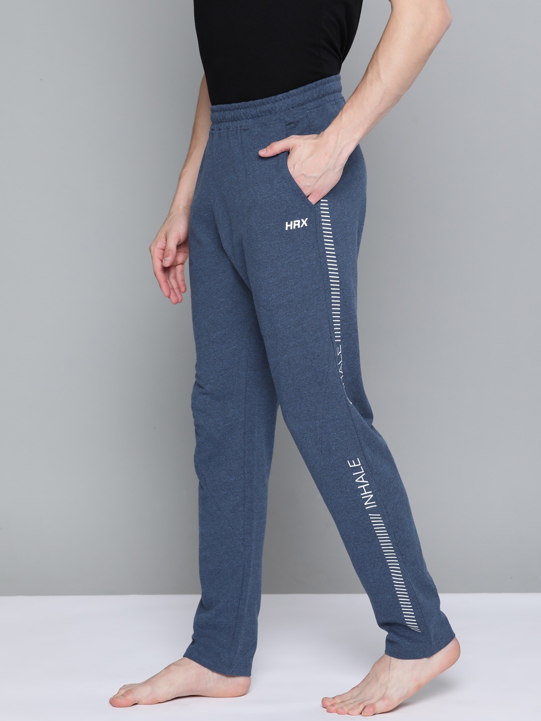 

HRX By Hrithik Roshan Yoga Men Navy Melange Rapid-Dry Solid Sustainable Track Pants, Navy blue