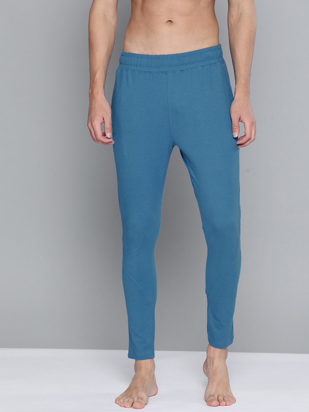 

HRX By Hrithik Roshan Yoga Men Atlantic Blue Rapid-Dry Solid Sustainable Track Pants