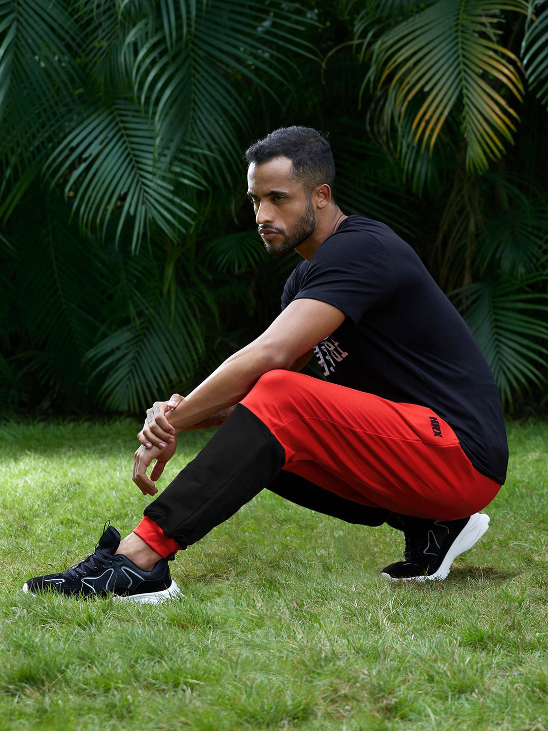 

HRX By Hrithik Roshan Lifestyle Men High Risk Red Lycra Colourblock Joggers