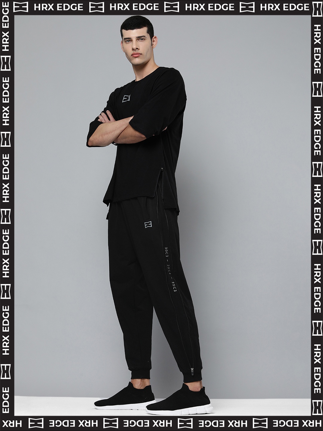 

HRX By Hrithik Roshan EDGE Lifestyle Men Jet Black Bio-Wash Typography Track Pants