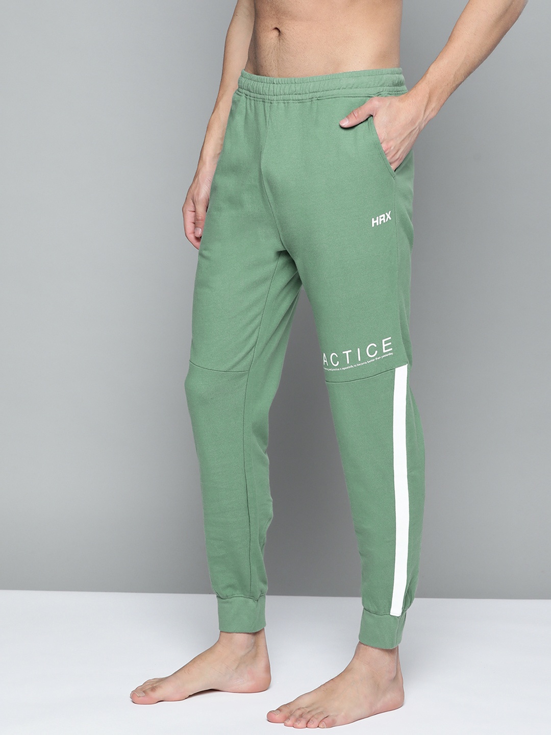 

HRX By Hrithik Roshan Yoga Men Wavellite Organic Cotton Rapid-Dry Solid Yoga Sustainable Joggers, Green