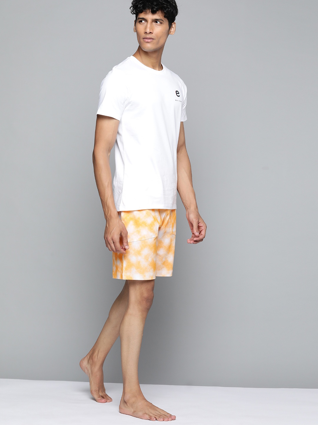 

HRX By Hrithik Roshan Yoga Men Orange & White Pure Cotton Rapid-Dry Typography Sustainable Shorts