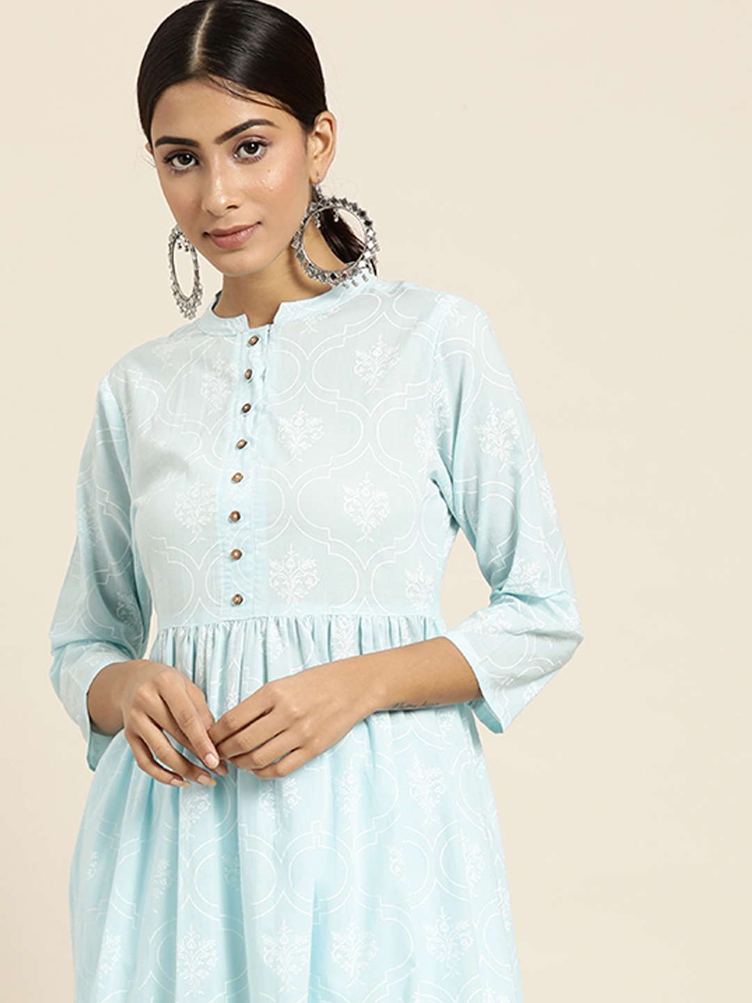 

Moda Rapido Women Blue & White Motifs Print A-line Pure Cotton Kurta with Palazzos