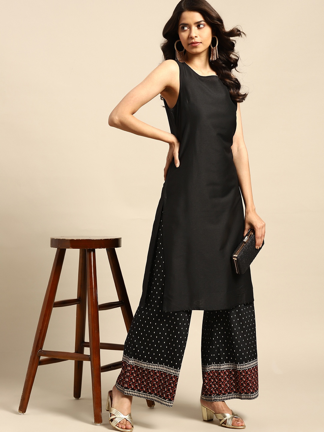 

all about you Women Black Solid Regular Kurta with Palazzos