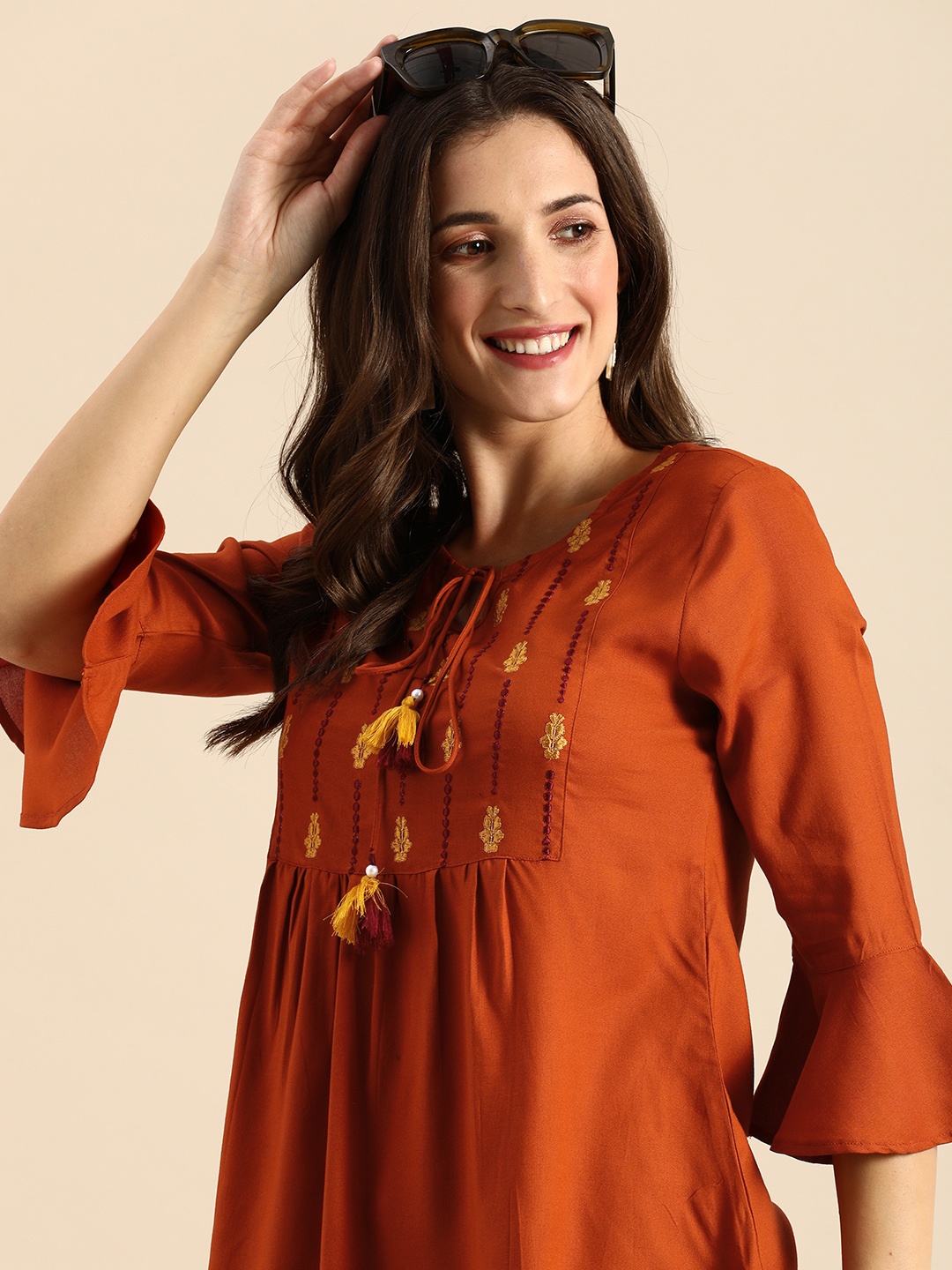 

all about you Brown Ethnic Motifs Embellished Thread Work Empire Styled Kurti