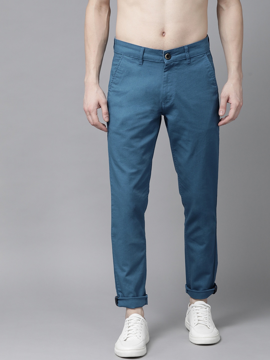 

Roadster Men Blue Self Design Trousers
