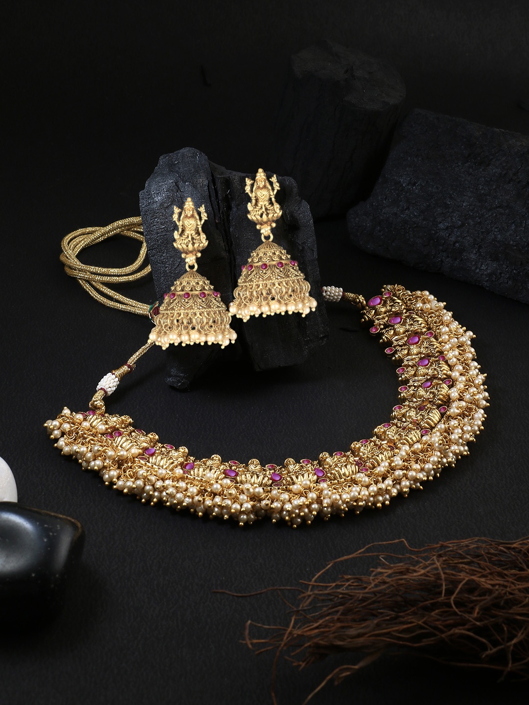 

Adwitiya Collection Gold-Plated Purple & Off-White Stone-Studded & Beaded Antique Temple Jewellery Set