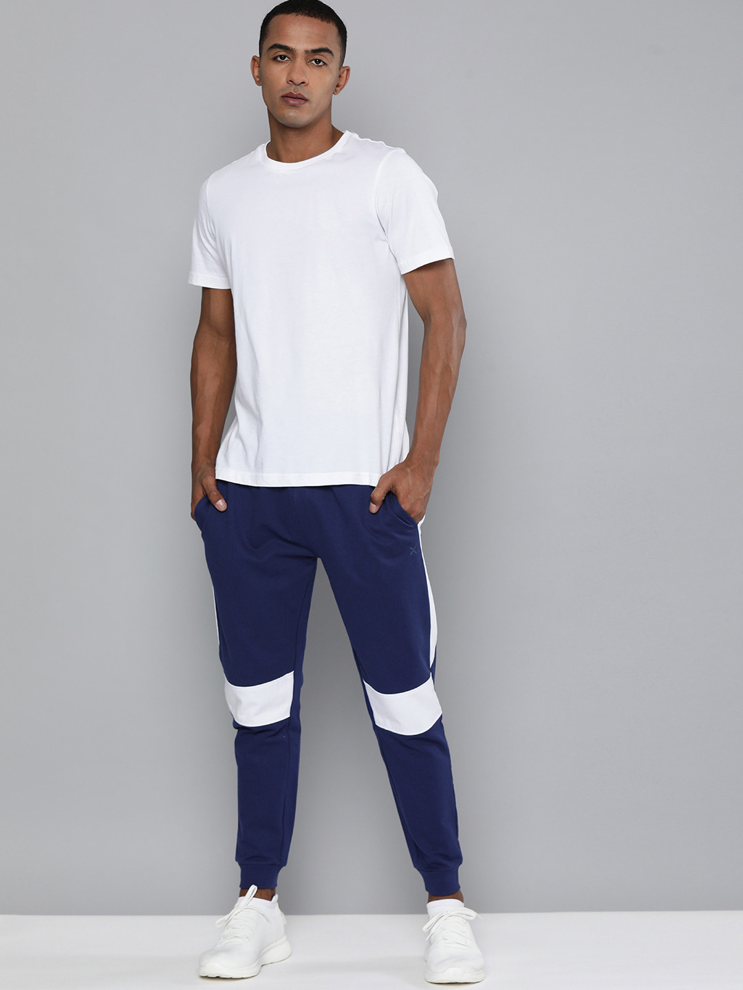 

HRX By Hrithik Roshan Men Blue & White Colourblocked Regular Bio-Wash Lifestyle Joggers