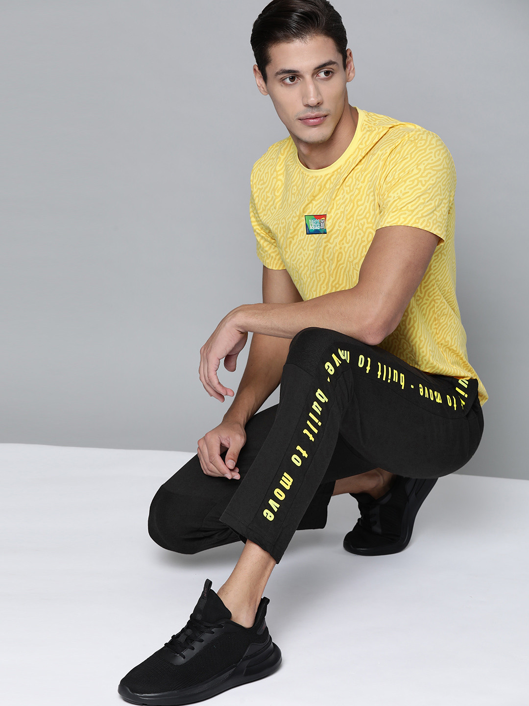 

HRX by Hrithik Roshan Men Charcoal Grey Pure Cotton Printed Detail Track Pants