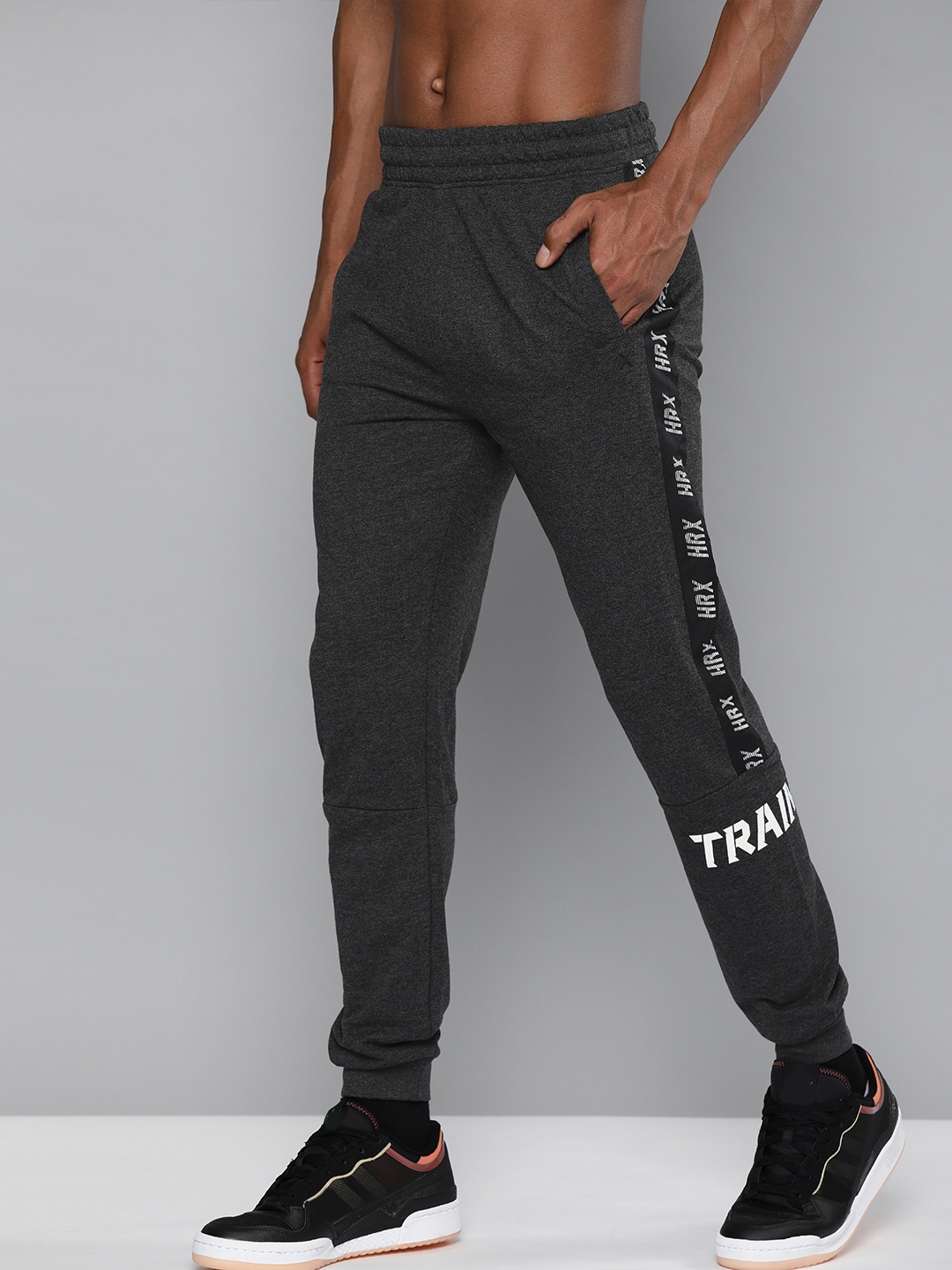 

HRX By Hrithik Roshan Men Anthra Melange Typographic Slim Fit Rapid-Dry Training Joggers, Navy blue