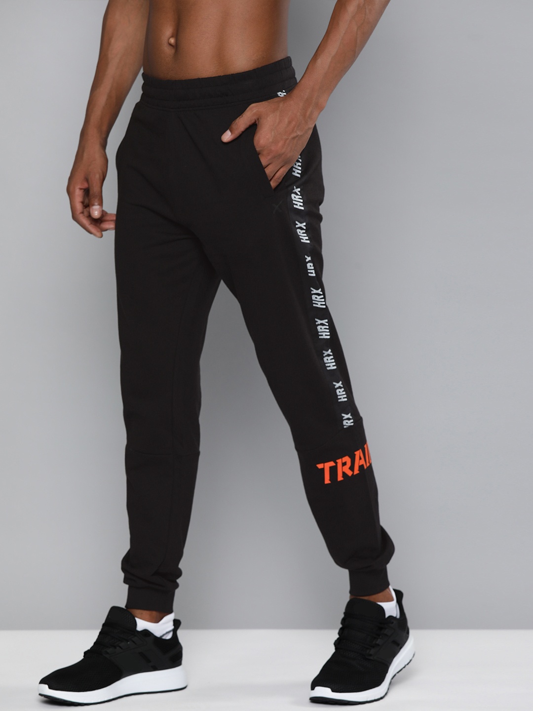 

HRX By Hrithik Roshan Men Jet Black Typographic Slim Fit Rapid-Dry Training Joggers