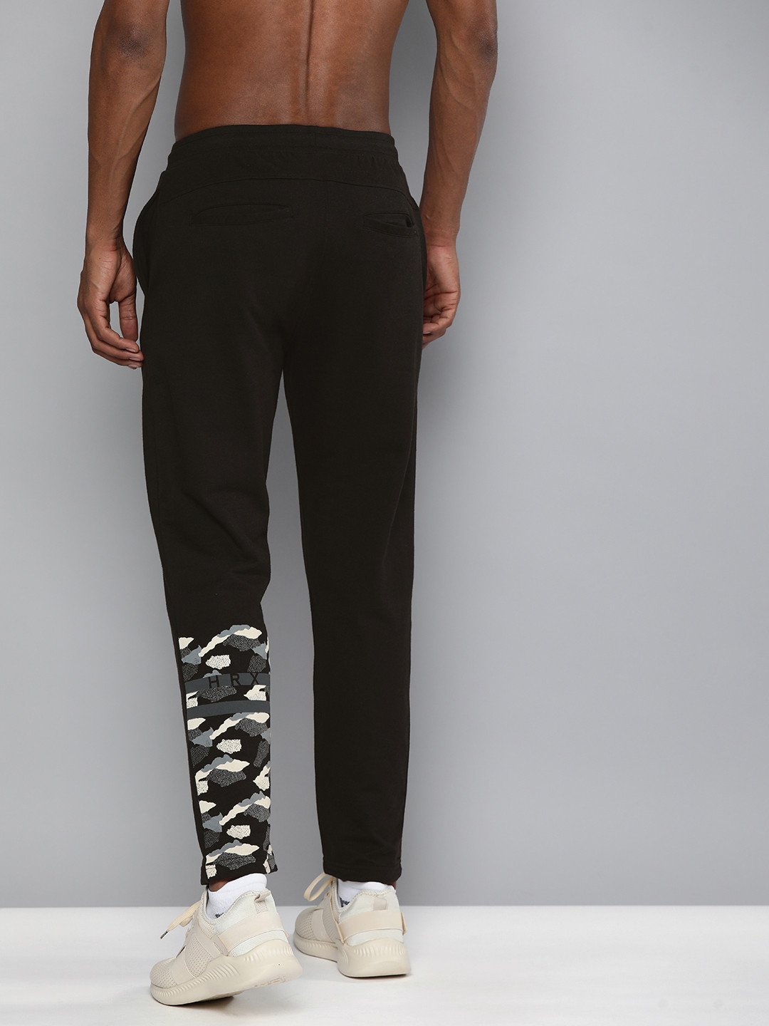 

HRX By Hrithik Roshan Men Jet Black Printed Regular Fit Bio-Wash Lifestyle Track Pants