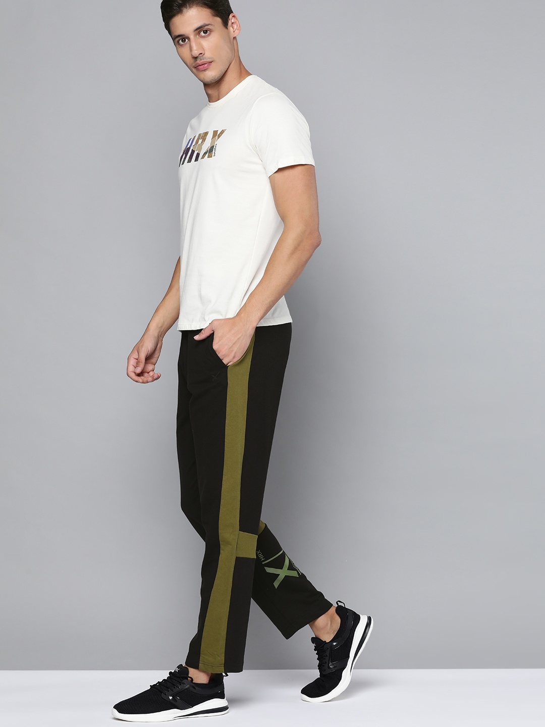 

HRX By Hrithik Roshan Men Jet Black Typographic Regular Fit Bio-Wash Lifestyle Track Pants