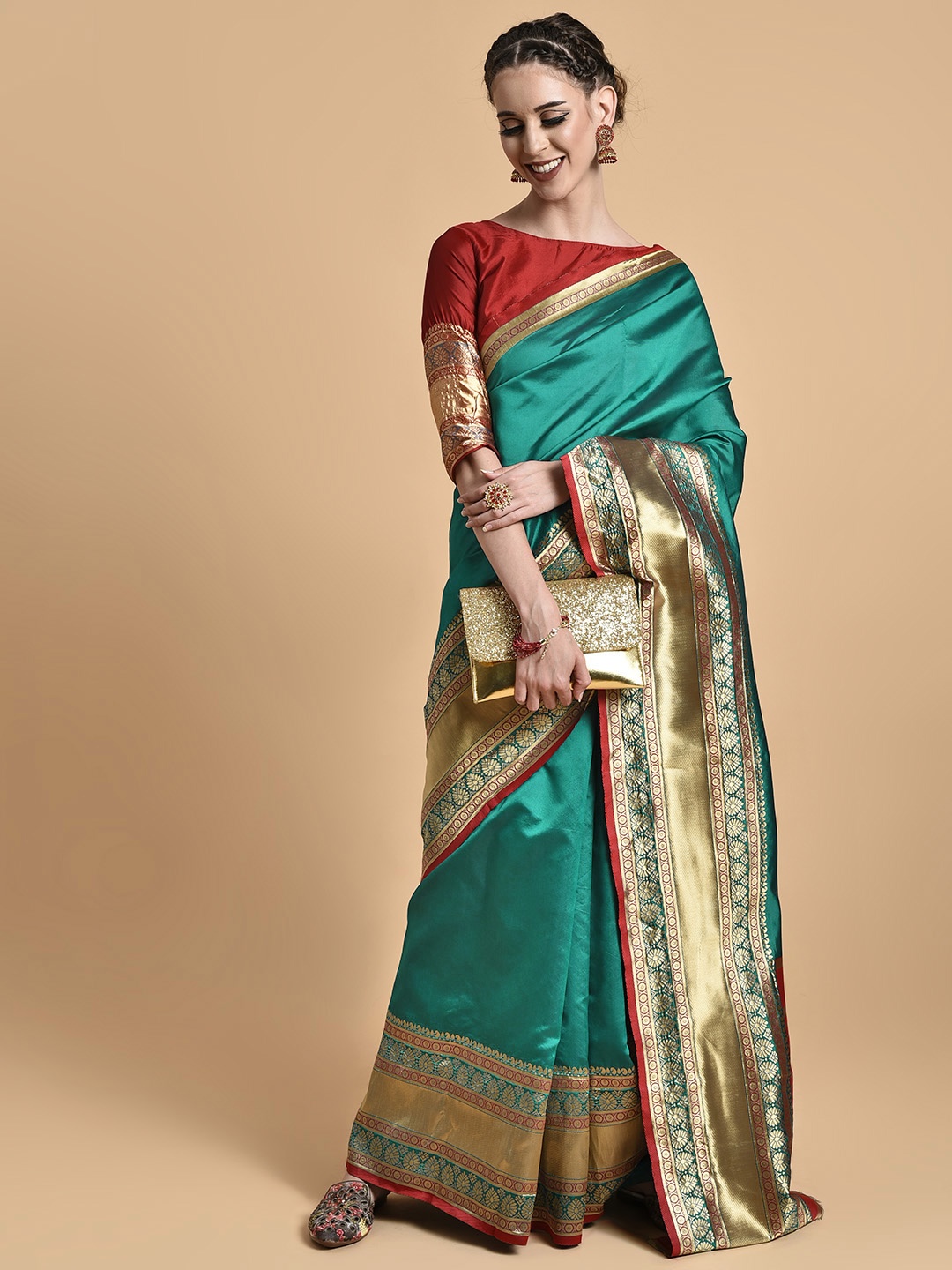 

Sangria Women Teal & Golden Zari Heavy Work Banarasi Saree