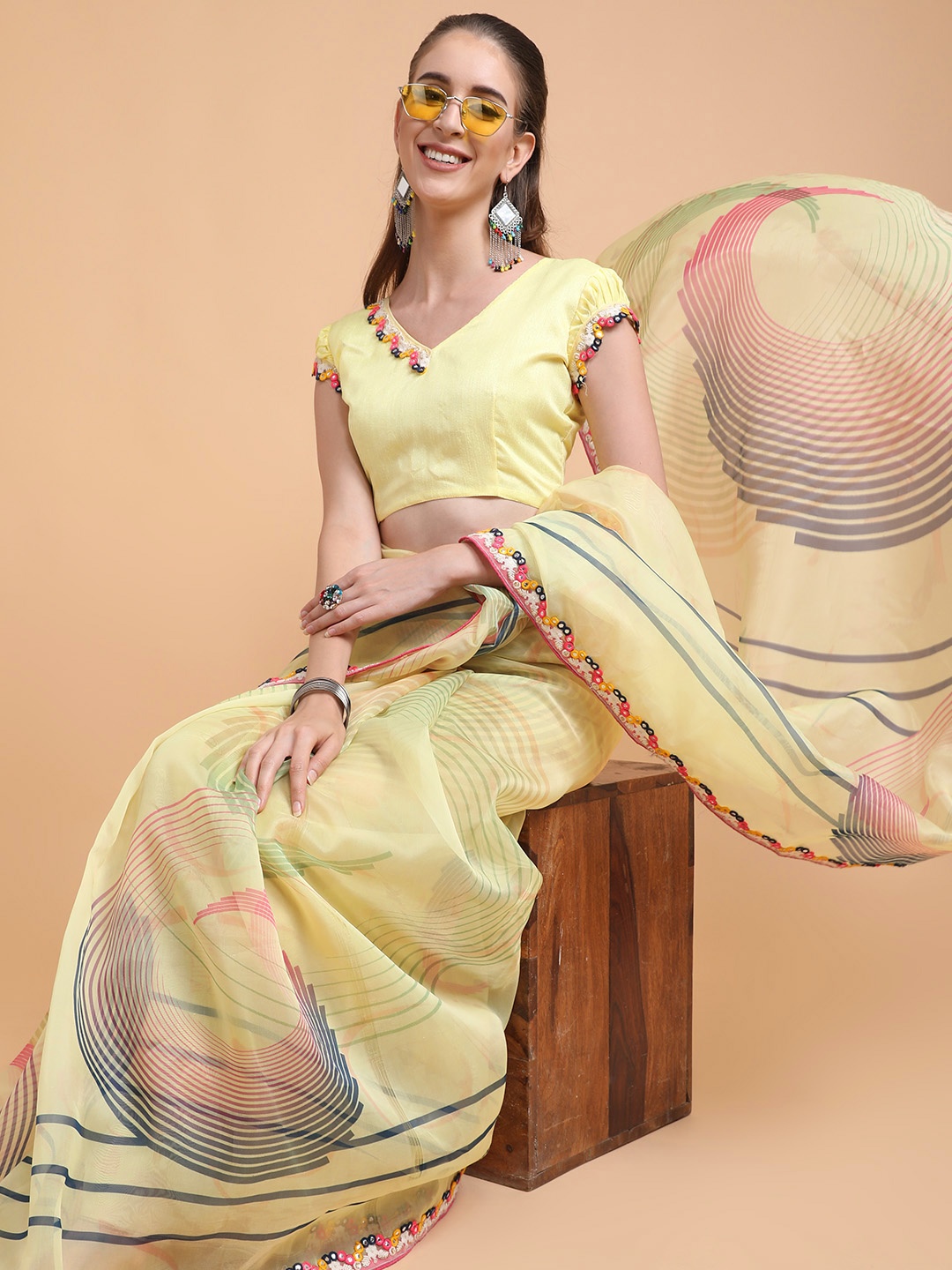 

Sangria Women Yellow & Pink Sequinned Organza Saree