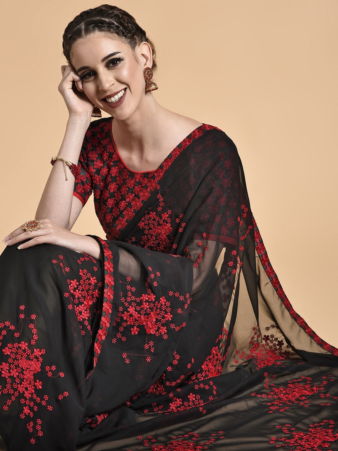 

Sangria Women Black & Red Floral Embroidered Saree
