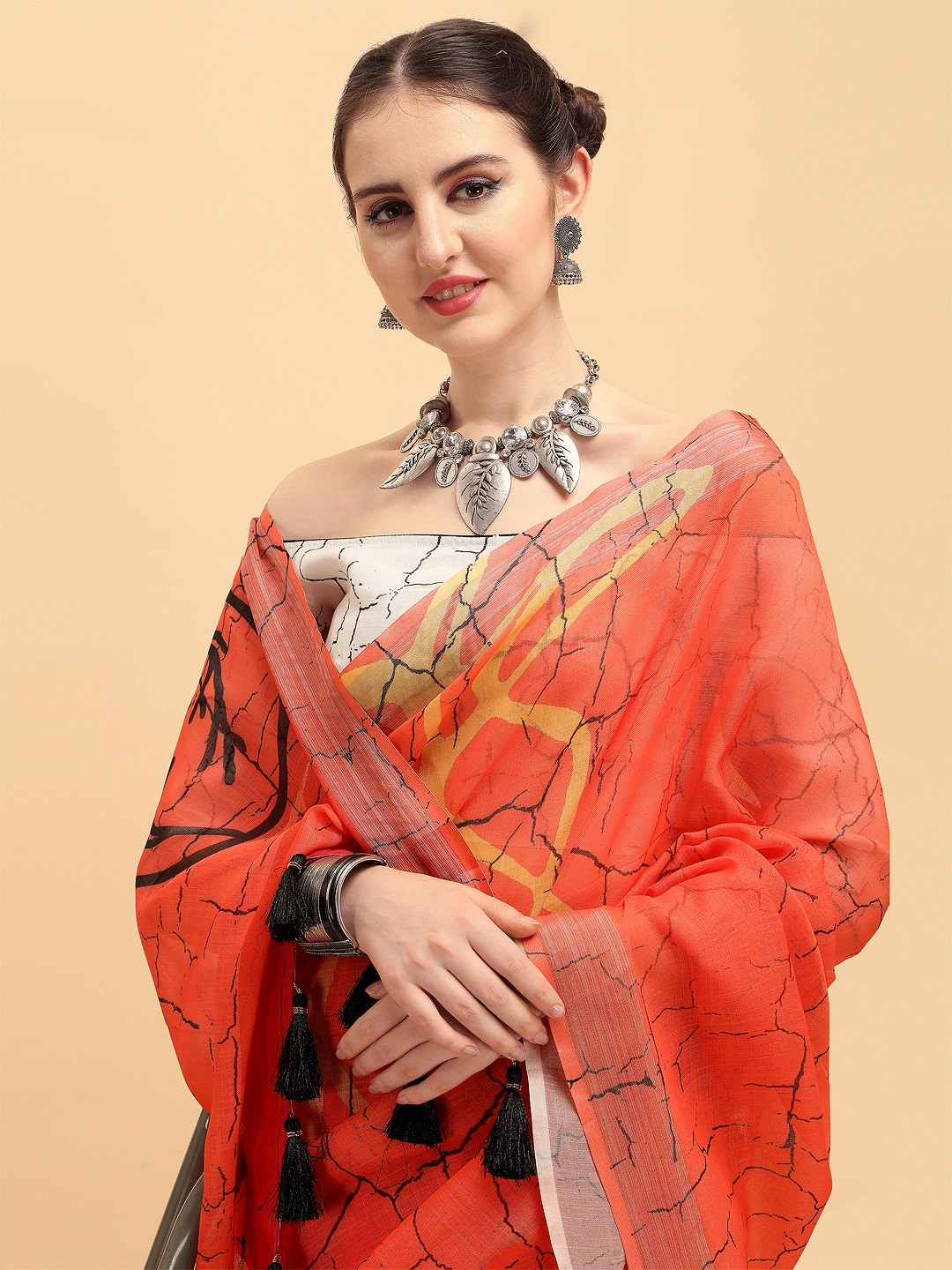 

Sangria Orange & Black Tie and Dye Zari Pure Linen Saree