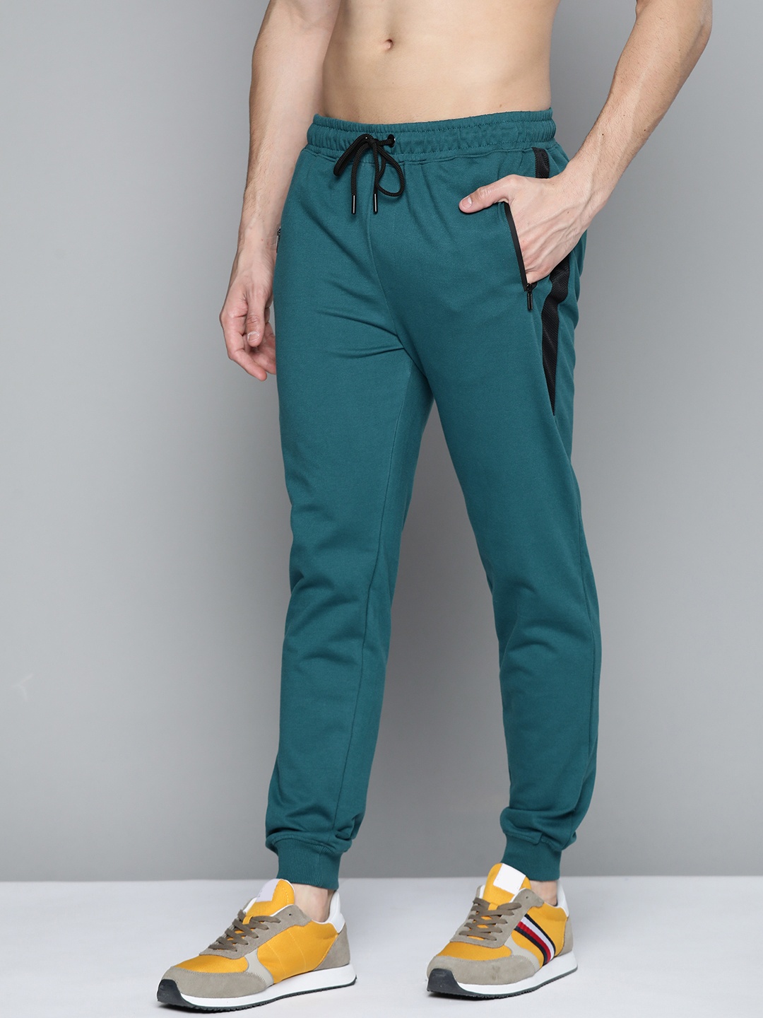 

Harvard Men Teal Green Solid Joggers