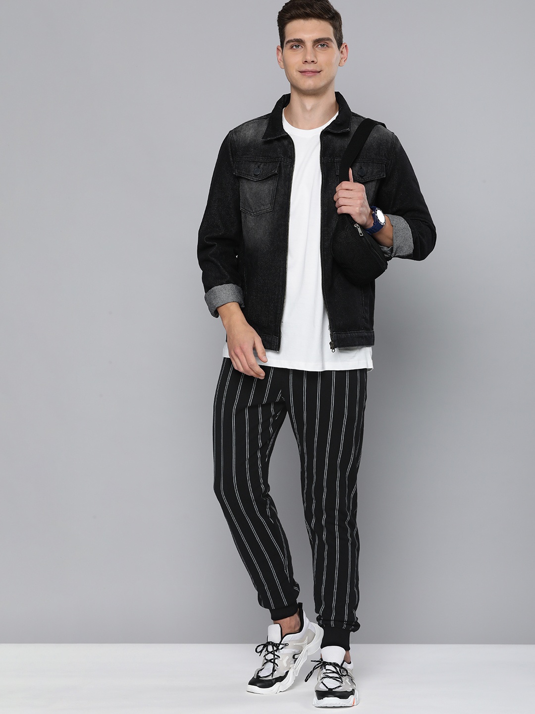 

Harvard Men Black & White Striped Mid Rise Elasticated Casual Joggers Track Pants