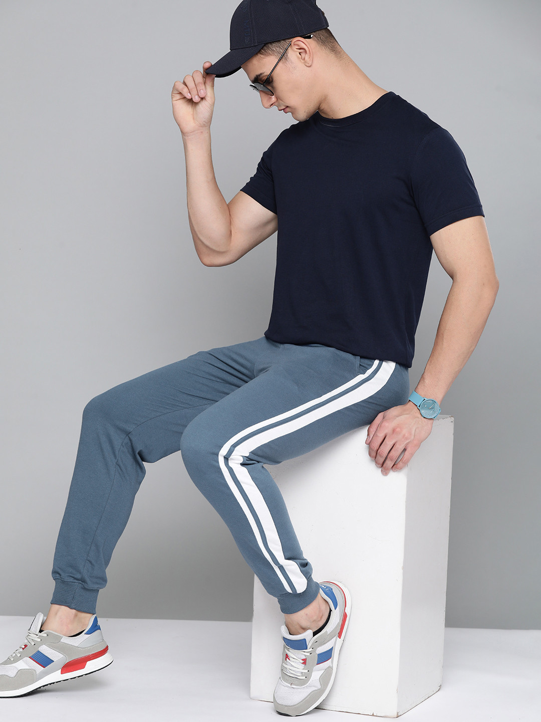 

Harvard Men Blue Solid Joggers with Side Stripes