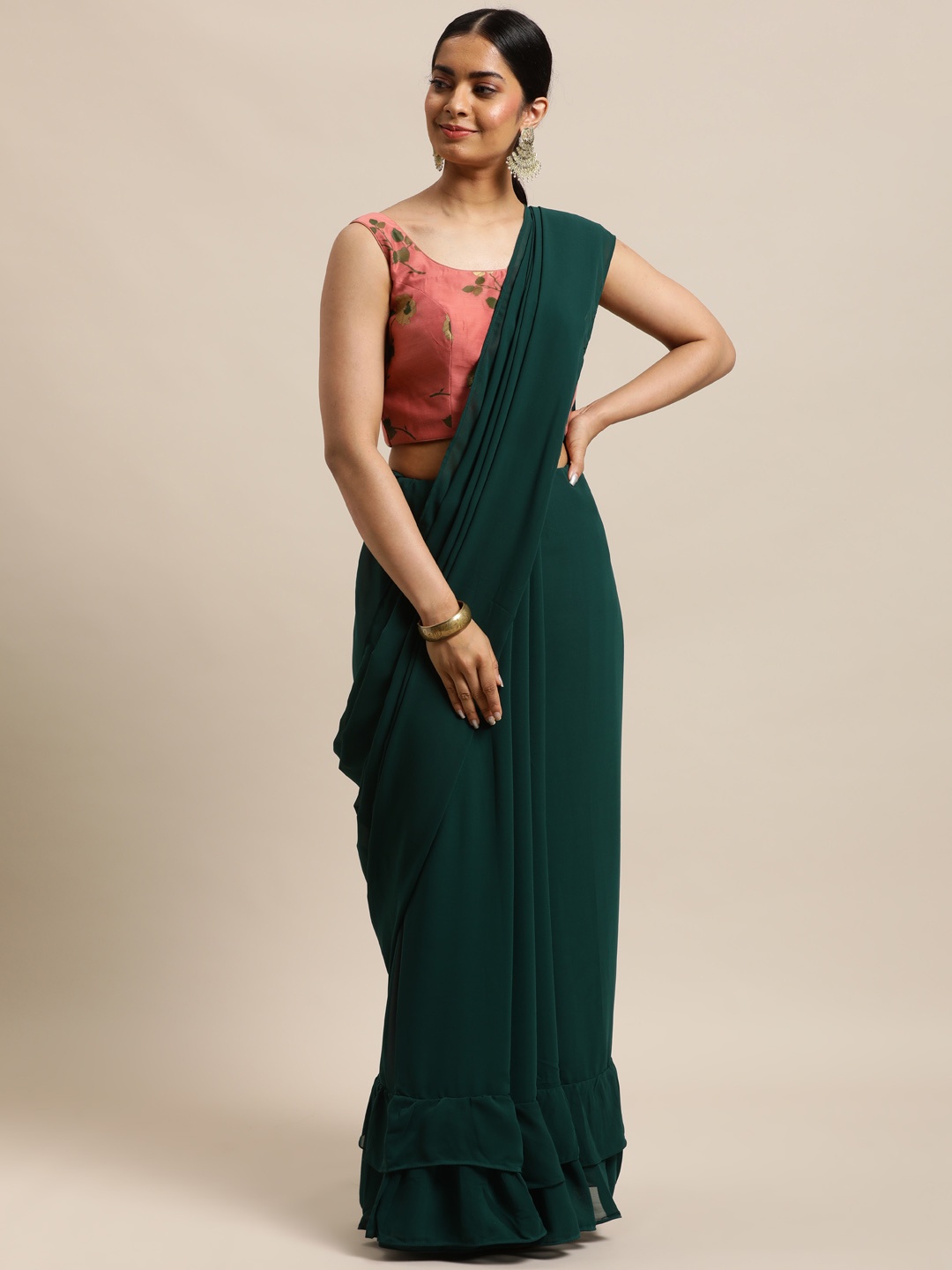

Ethnovog Green Ruffled Saree With Stitched Blouse