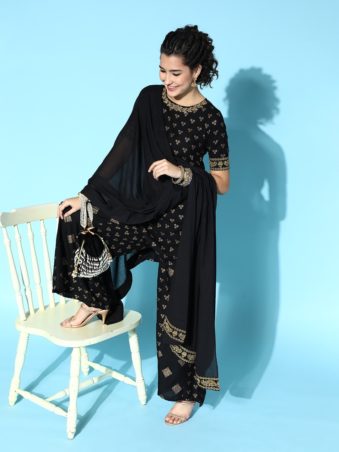 

Moda Rapido Women Black & Golden Printed Thread Work Kurta with Palazzos & Dupatta