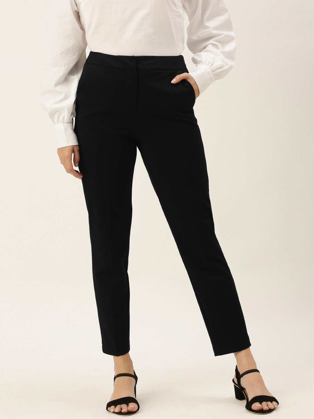 

Koton Women Black Solid Trousers