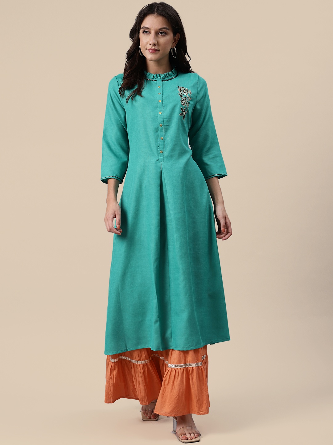 

Sangria Women Teal Green & Orange Floral Embroidered Kurta With Skirt