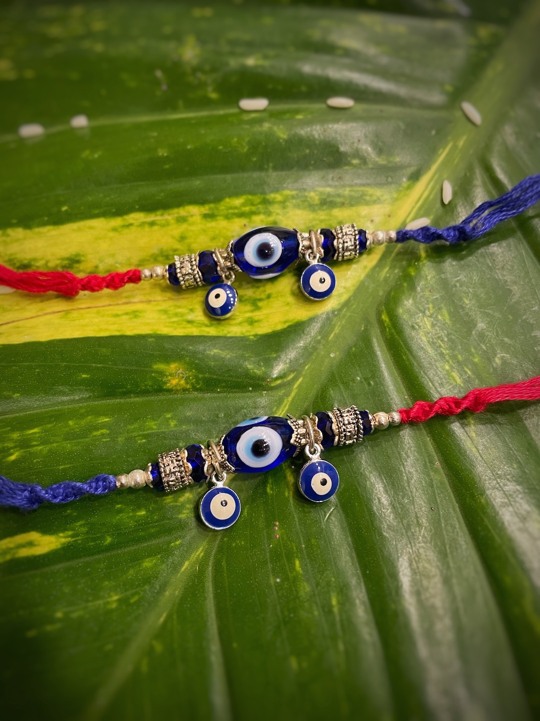 

Digital Dress Room Set of 2 Blue Evil Eye Designs Rakhi