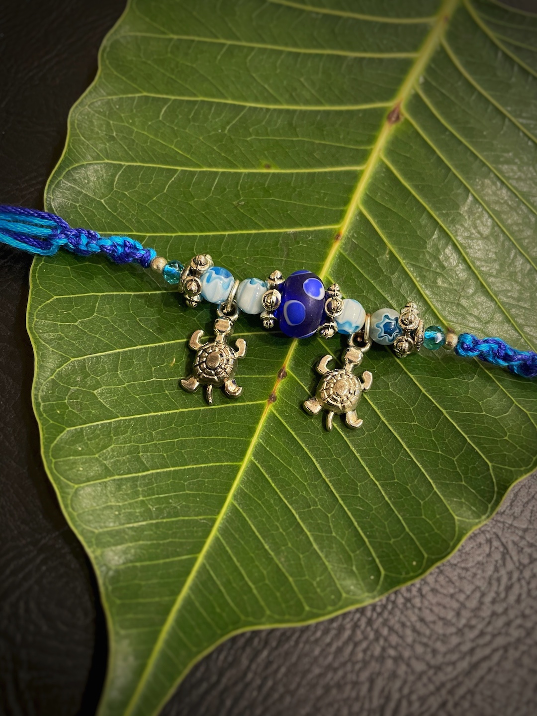 

Digital Dress Room Blue Evil Eye Rakhi