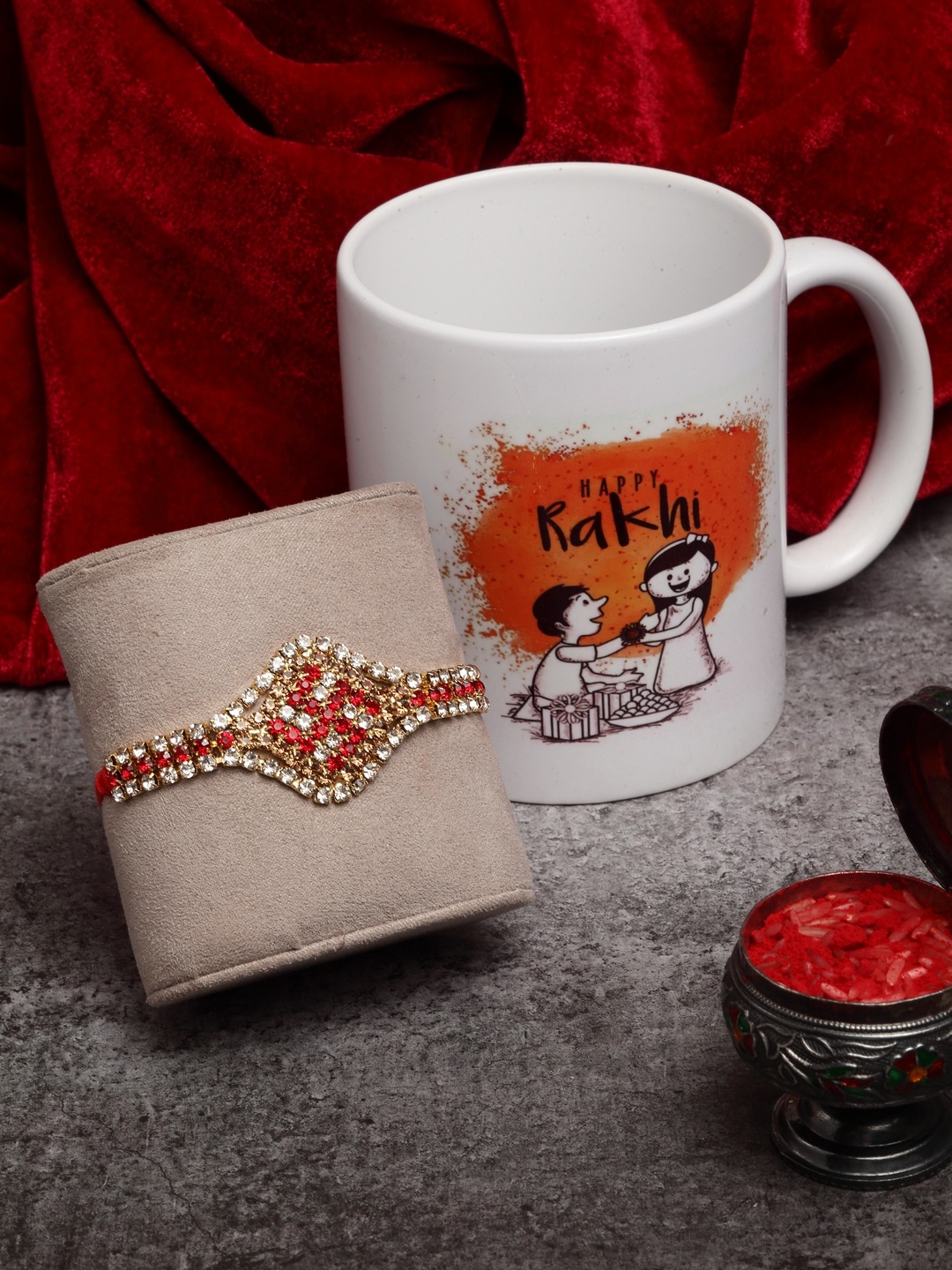

PANASH Gold-Toned CZ Studded Swastik Rakhi With Mug & Roli Chawal