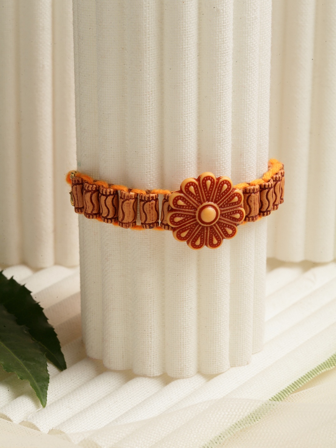 

PANASH Orange & Brown Floral Rakhi With Roli Chawal