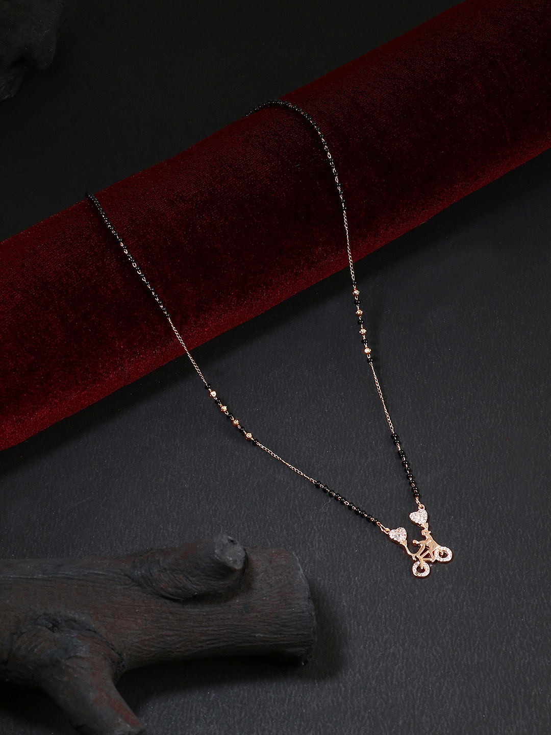 

Adwitiya Collection Rose Gold-Plated White Stone-Studded Handcrafted Mangalsutra