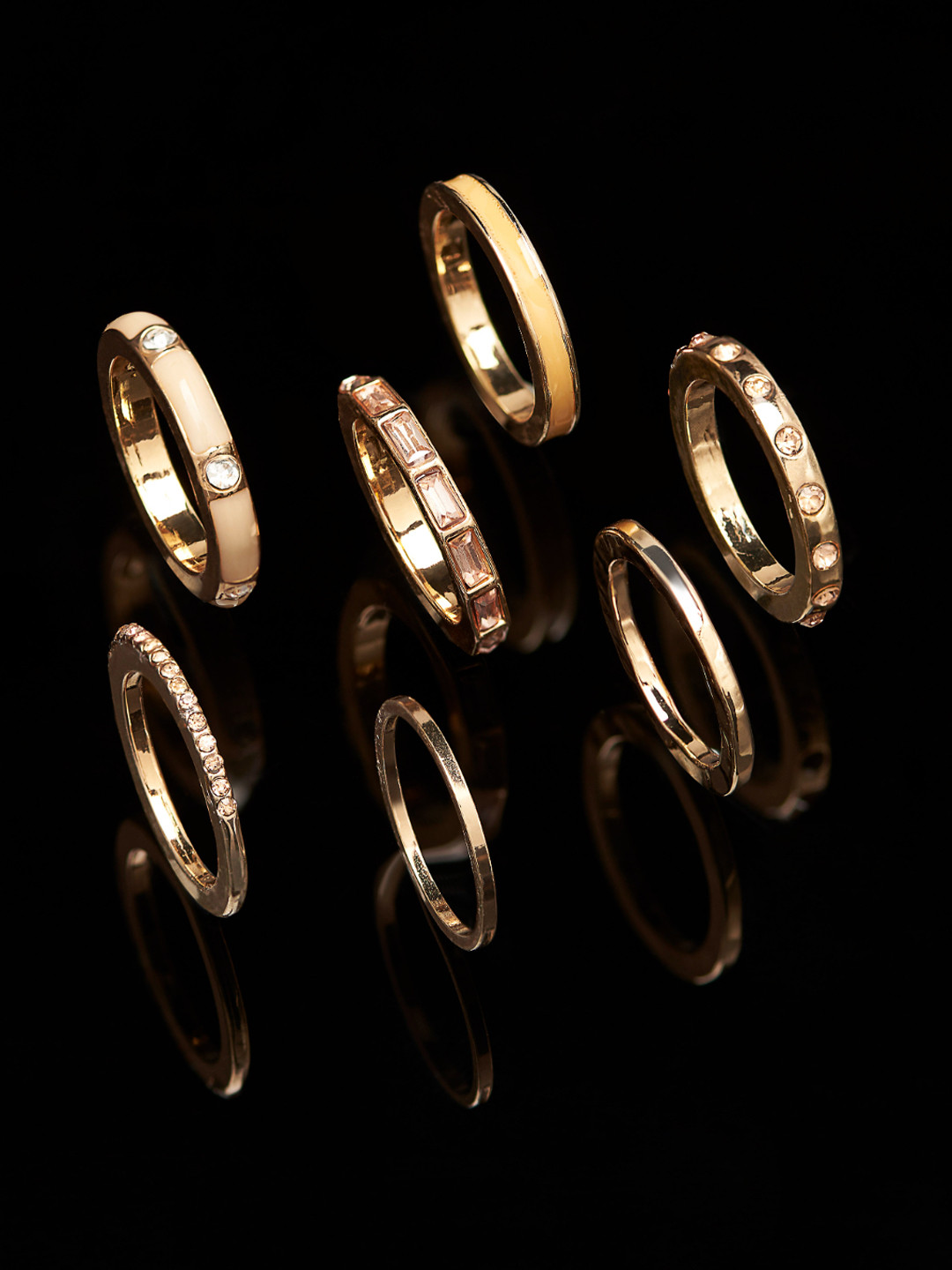 

AMI Women Set Of 7 Gold-Plated White Stone-Studded Stackable Finger Rings