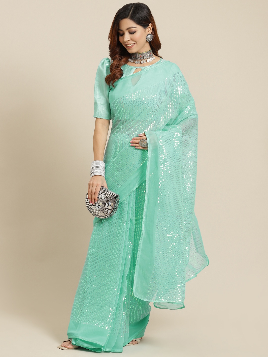 

Mitera Turquoise Blue Embellished Sequinned Saree