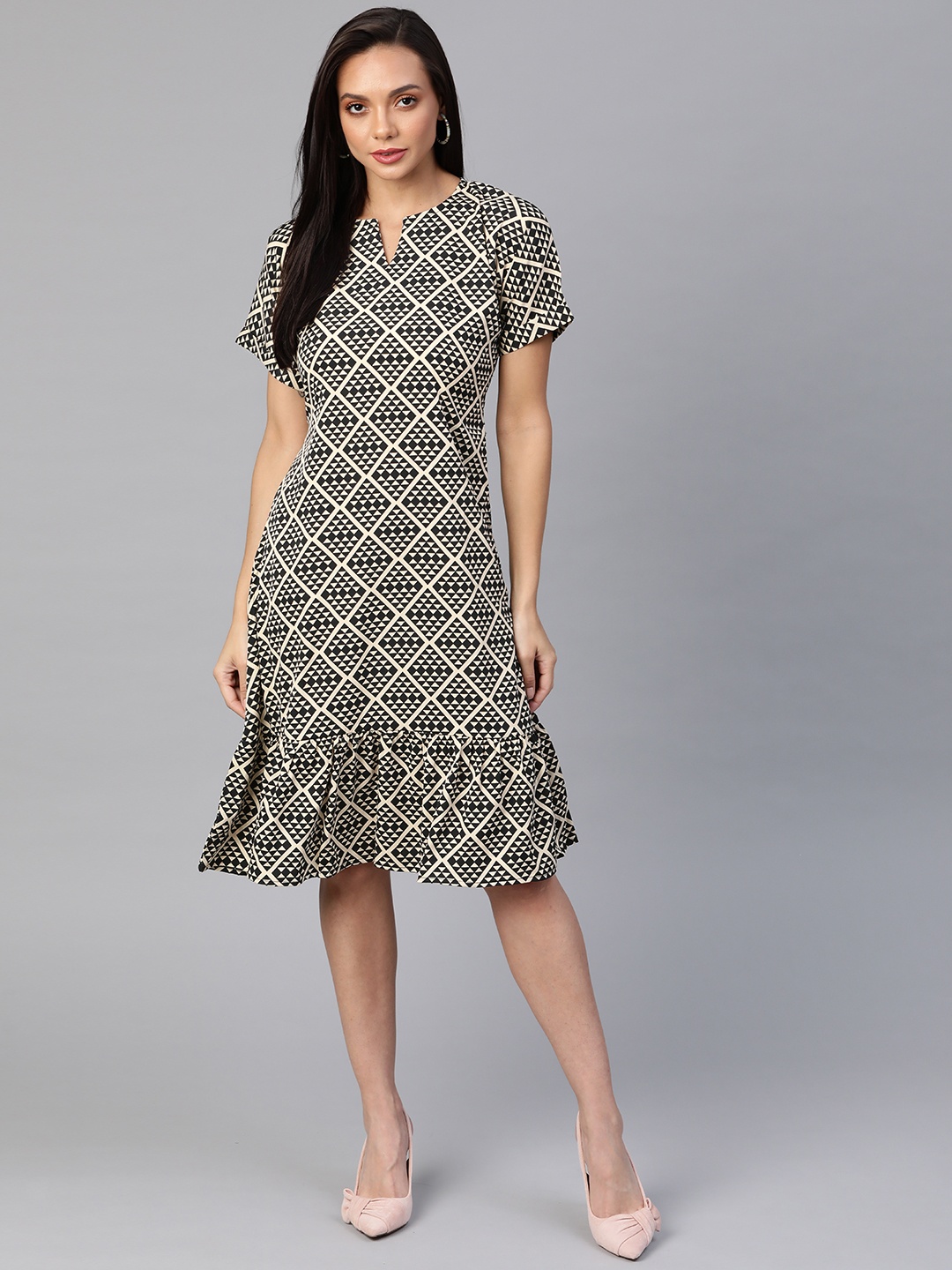 

Cottinfab Black & Beige Printed Midi A-Line Dress